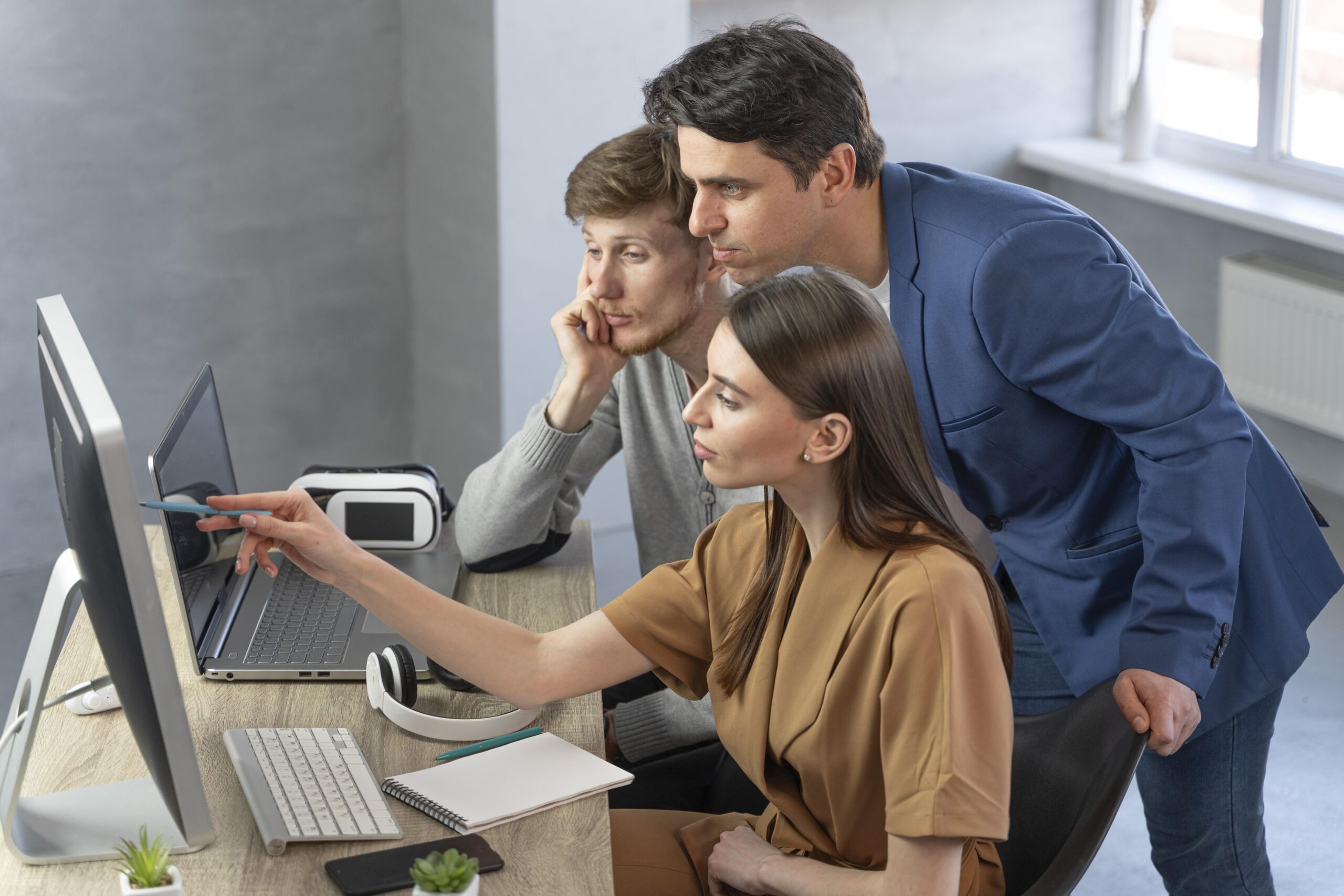 side-view-team-professionals-working-with-new-technology